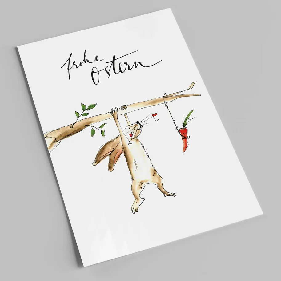 Postkarte - Osterhase hangelt am Baum